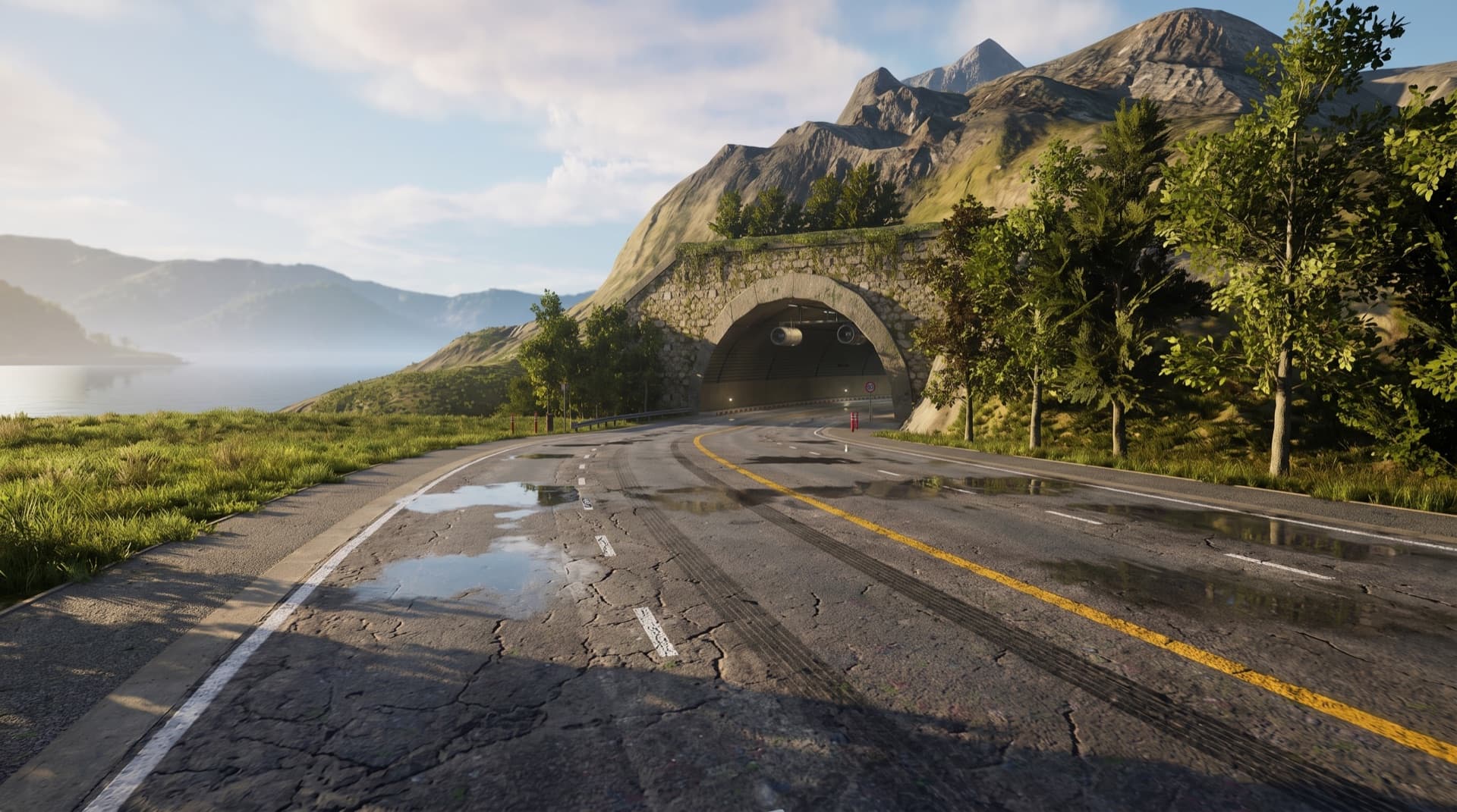Traffic Racer Pro Drift Mansion — a wet mountain road leading into a stone tunnel beside a lake